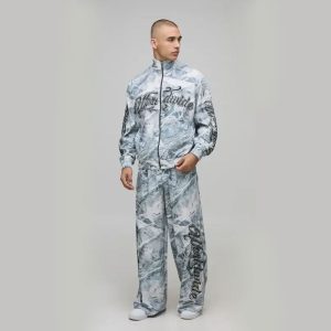 Tracksuits Boxy Fit Funnel Neck Zip Through Rhinestone Camo Woven Tracksuit